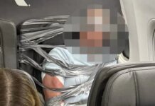 Пассажир рейса American Airlines устроил драку и высказывал расистские оскорбления во время полета — его привязали скотчем к креслу